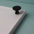 Brisbane black kitchen cabinet knob by Otoley – modern matte black knob for drawers and cabinets, ideal for contemporary kitchen and bathroom renovations.