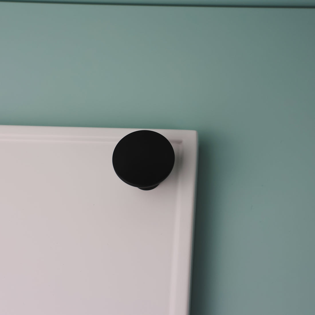 Brisbane black kitchen cabinet knob by Otoley – modern matte black knob for drawers and cabinets, ideal for contemporary kitchen and bathroom renovations.