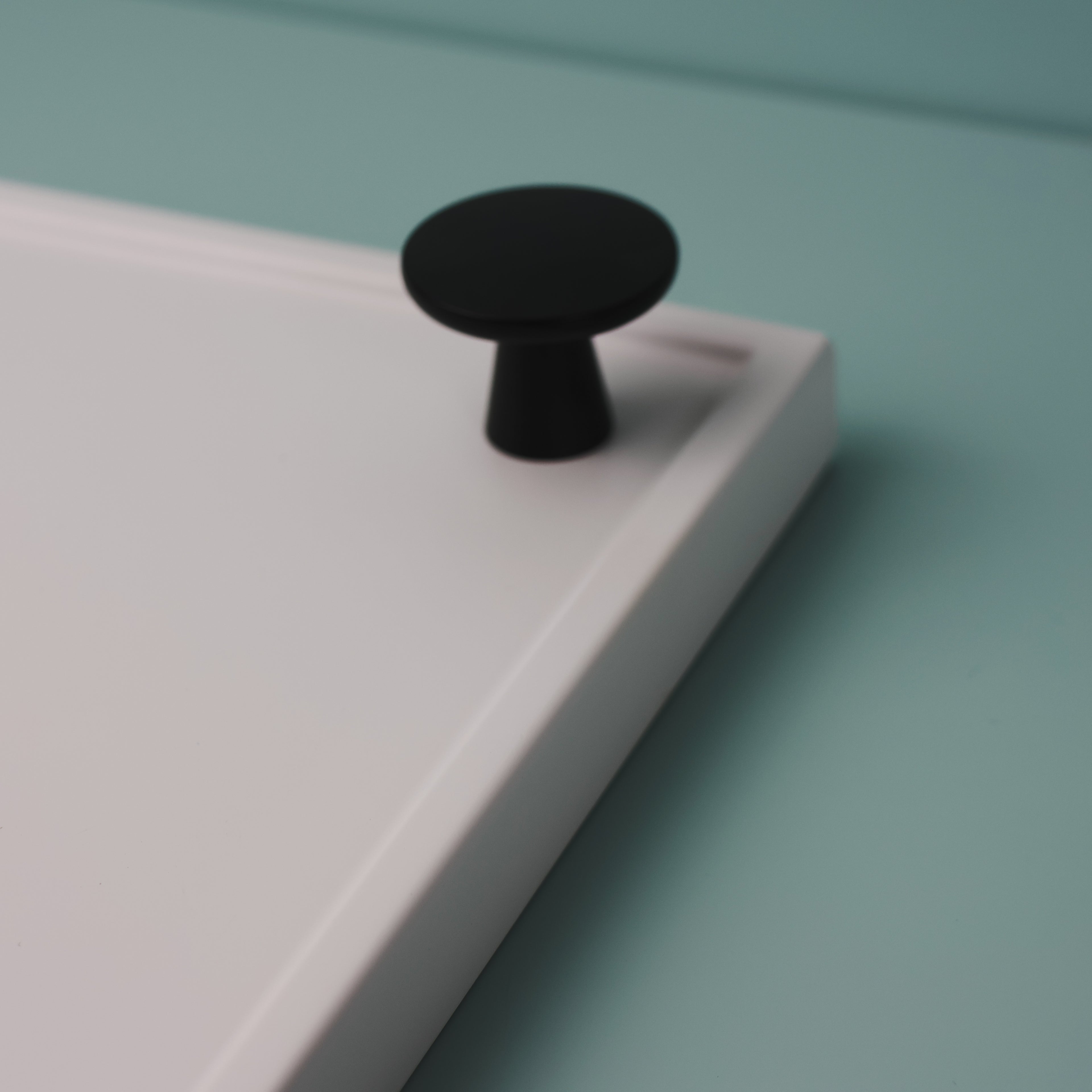 Brisbane black kitchen cabinet knob by Otoley – modern matte black knob for drawers and cabinets, ideal for contemporary kitchen and bathroom renovations.